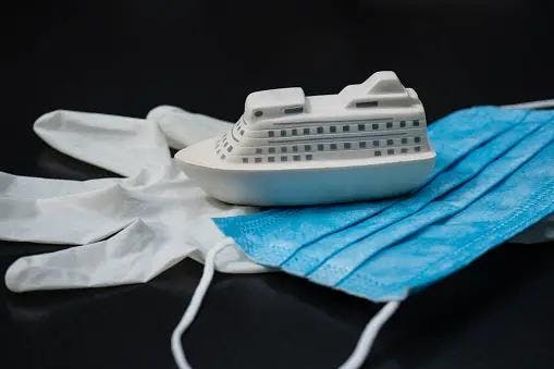 Gloves, masks, and a cruise ship highlight the importance of maintaining health protocols on ships during disease outbreaks.